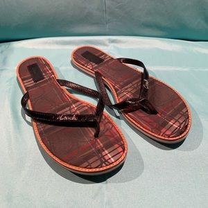 Black Coach flip-flops